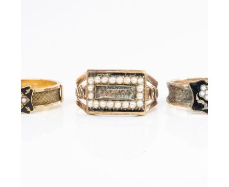 THREE 19TH CENTURY MOURNING RINGS (3)One with four panels of black enamel, fully hallmarked 18ct London 1888, inscribed 'Beat