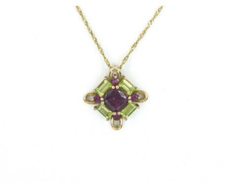 A GARNET AND PERIDOT PENDANT NECKLACEWith a central square garnet, surrounded by four peridots and four further garnets, on a