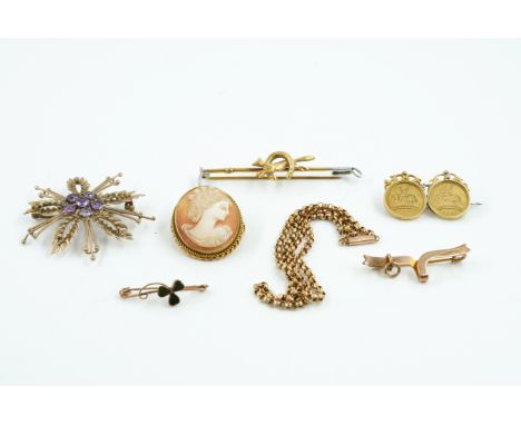 SIX BROOCHES AND A GOLD NECKCHAIN (7)Comprising; a gold mounted oval shell cameo brooch, carved as the portrait of a lady, de