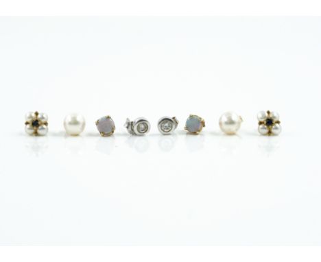 A PAIR OF OPAL SINGLE STONE EARSTUDS AND THREE FURTHER PAIRS OF EARSTUDS (4)Also a pair of cultured pearl earstuds, a pair of