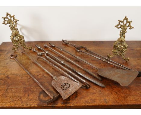 TWO SETS OF STEEL FIRETOOLS AND A PAIR OF FIRE DOGS (9)Late 19th/Early 20th CenturyComprising a set of three tools including 