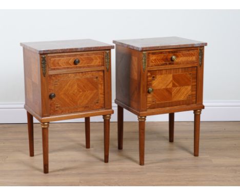 A PAIR OF LOUIS XVI MARBLE TOPPED BEDSIDE CUPBOARDS (2)With gilt metal mounted kingwood bases, 44cm wide; 36cm deep; 69cm hig