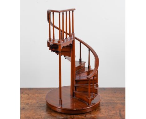 A MAHOGANY ARCHITECTURAL MODEL OF A SPIRAL STAIRCASELate 20th Century, 61cm high