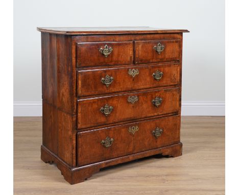 A GEORGE I WALNUT FIVE DRAWER CHESTOn bracket feet, 104cm wide; 52cm deep; 98cm high