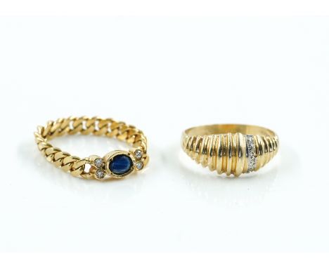 TWO GOLD RINGS (2)Comprising; a faceted curb chain link ring, collet with an oval cut sapphire between two pairs of circular 