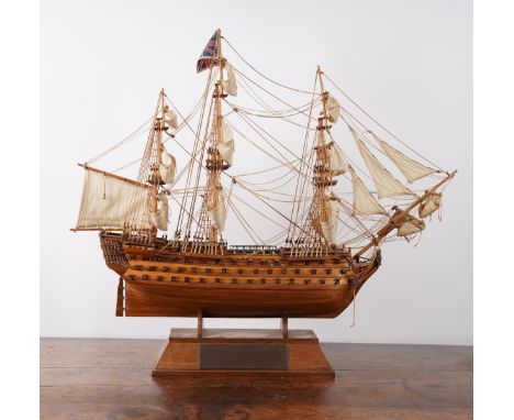 A MODEL OF THE H.M.S. VICTORY NAVAL WAR SHIPSecond half 20th Century Fully rigged, with anchors, lifeboats, cannons, on stand