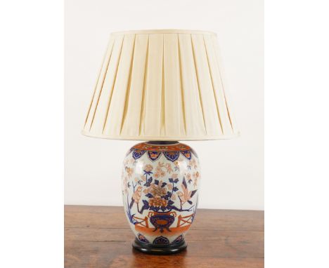 AN IMARI STYLE BALUSTER TABLE LAMP AND SHADEModern, Retailed by VaughanWith gilt-heightened decoration, 61cm high overall, in