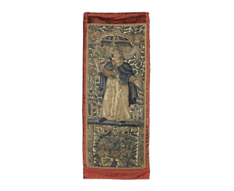 A charming tapestry fragment16th centurythe robed figure raised on a domed pergola, with fruiting vines and swagged drapery, 