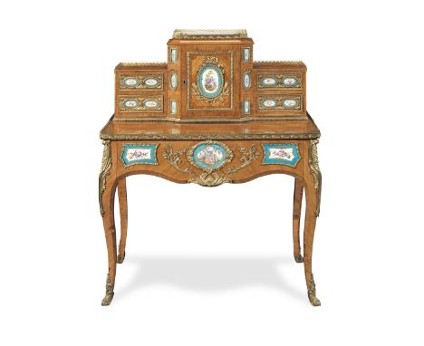 An early Victorian gilt bronze and porcelain mounted tulipwood and kingwood bonheur du jourin the late Louis XV style1850-186