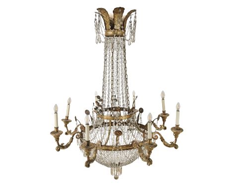 An impressive 19th century Italian gilt tole, carved wood and cut glass eight light tent and bag chandelierin the Empire styl