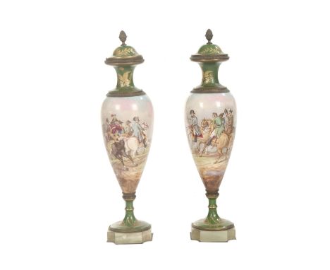 A pair of late 19th century gilt bronze mounted Sèvres-style porcelain vases and coversthe bodies signed M. Guillou, the cove