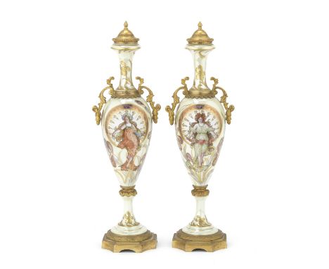 A pair of early 20th century French gilt bronze mounted Sevres style porcelain garniture vasesin the Art Nouveau tastethe sle