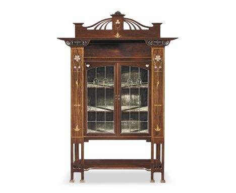 An Edwardian Arts and Crafts mahogany, mother of pearl, pewter and fruitwood inlaid display cabinet/buffetpossibly by Shaplan