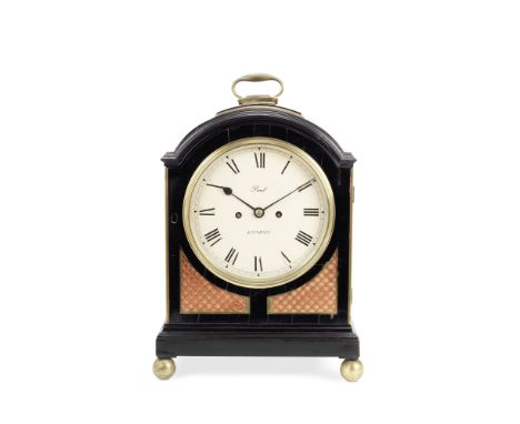 An early 19th century ebonised single pad top table clockthe dial signed Paul, London, the movement, Paul, Cleveland Street, 