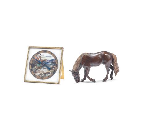 An early 20th century gilt bronze and painted ivorine desk timepiece together with an Austrian cold painted bronze model of h