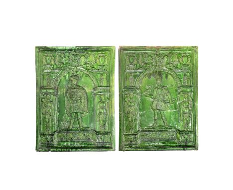 A pair of Continental green glazed pottery stove tilesprobably Flemish, 19th century, in the late 16th / 17th century styleea