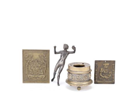A bronze inkwell, two patinated bronze plaquettes and a silvered bronze figurethe inkwell and the plaquettes, 17th-19th centu
