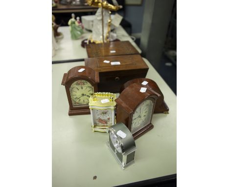 SARCOPHAGUS SHAPED WOODEN TEA CADDY, WOODEN INLAID WORK BOX, SMALL WOODEN CASED MANTEL CLOCK, AND FOUR OTHER BATTERY OPERATED