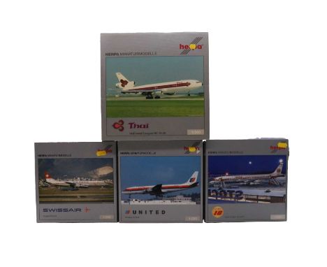 Seven Herpa model aircraft, including ref. 553179 NASA Super-Guppy; ref. 552905 Iberia Douglas DC-8-52; ref. 552745 United Ai