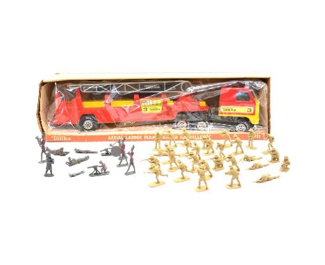 Tonka Toys ref. 1935 'Aerial Ladder Team', boxed, with twenty-nine loose plastic soldiers and eleven lead soldiers and figure