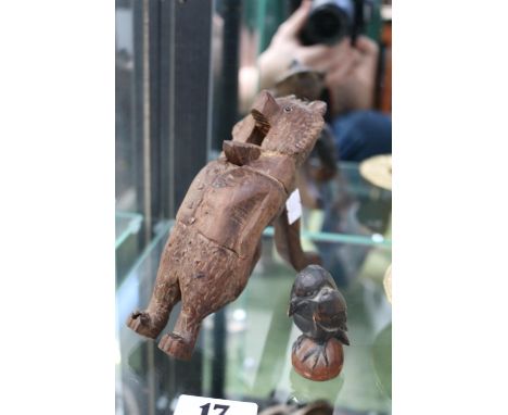 Black Forest Nut crackers in the form of a Bear and a Art Deco Carved figure of a Bird 