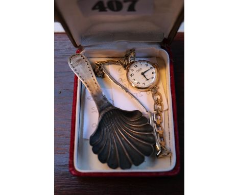 9ct Gold Ladies Rone wristwatch and a Silver Shell caddy spoon 