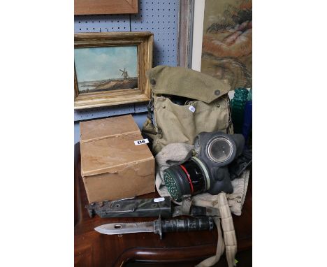 4 WWII Gas Masks relating to a singular family and a Survival Kit Knife in scabbard 