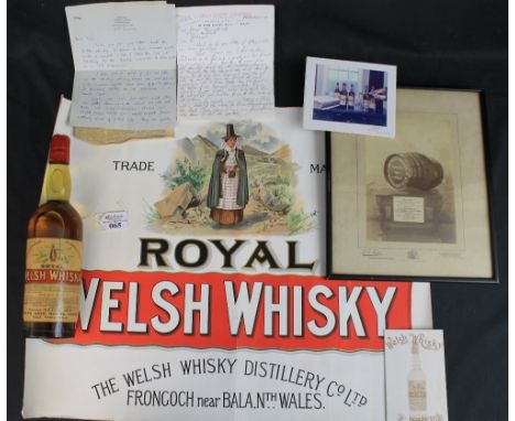 Bottle of Royal Welsh Whisky from the Welsh Whiskey Distillery, circa 1900, the label reading: 'As Supplies to HM the Queen a