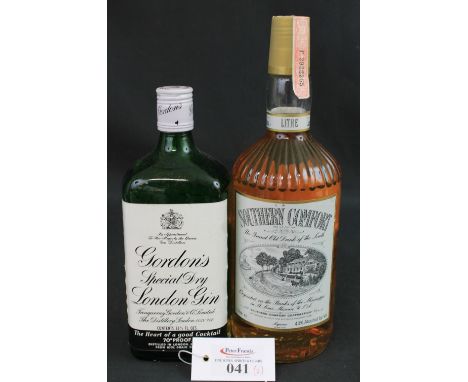 One litre bottle of Southern Comfort, 'The Grand Old Drink of the South', duty free for exportation only.  43% vol.  together
