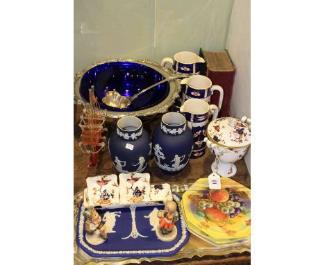 Large silver plate punch bowl and ladle, pair of Wedgwood blue jasper vases and plate, three graduated jugs, two Hummel figur