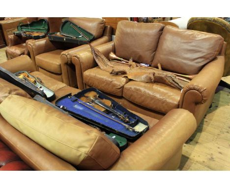 Natuzzi brown leather three piece lounge suite comprising three seater settee, two seater settee and easy chair