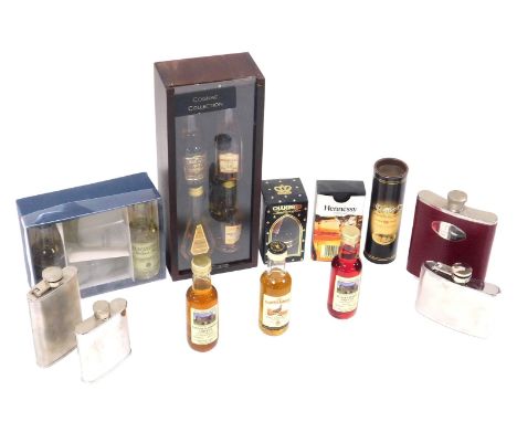 A group of alcohol miniatures, including a four bottle cognac collection, Glenturret whisky, Chambord, and Hennessy cognac, t