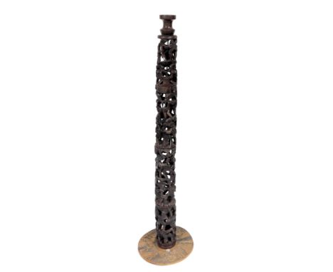 A 20thC African tribal carved pillar, of four sections formed as many figures, with elaborate hair and clothing, on turned po