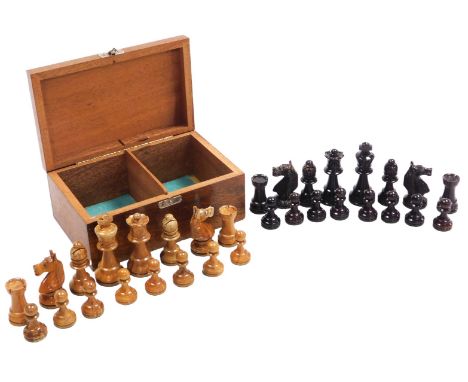 A Staunton type chess set, the knights with glass inset eyes, boxed, Queen 7cm high. (AF)