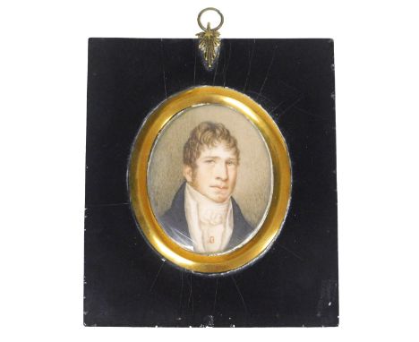 An early 19thC miniature portrait of a gentleman, head and shoulders study with a high collar, 7cm x 6cm. 
