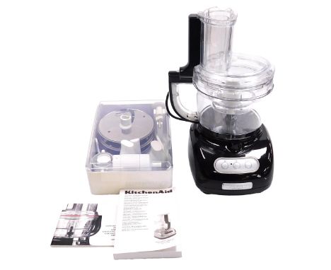 A Kitchenaid Artisan Food Processor, in black, model no. 5KPFM771, together with a box containing blades, and other tools, in