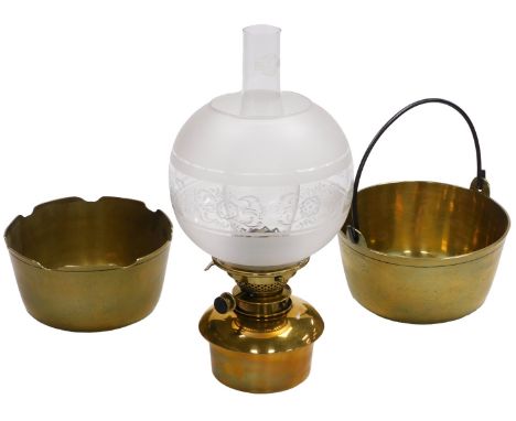 An early 20thC Hinks's duplex wall mounted oil lamp, with chimney and frosted and etched glass shade, 40.5cm, together with a