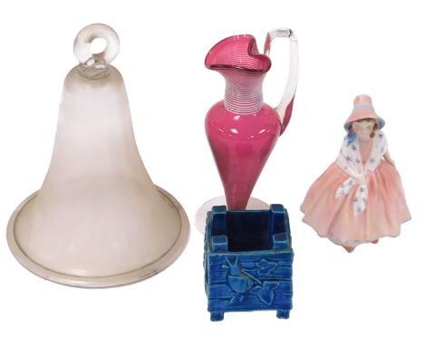 A 19thC glass smoke bell, cranberry glass jug with white glass ribbed decoration, Royal Doulton figure modelled as Lily HN179