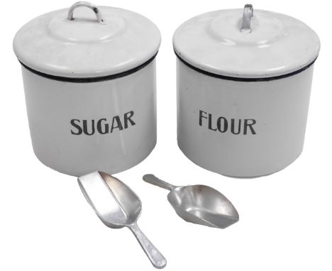 A pair of Prince wares enamel storage jars and covers, for flour and sugar, with scoops, printed marks, 18cm high.