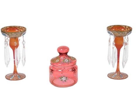A pair of late 19thC frosted red glass lustres, with painted C scroll decoration, with tear and brilliant cut drops, 18cm hig