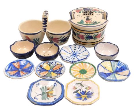 A group of Quimper pottery, including Henriot Quimper miniature plates and dishes, a salt box and cover, and a salt and peppe