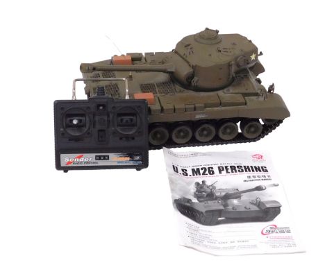 A Heng Long remote control USM26 Pershing battle tank, scale 1/16, with remote and instruction manual. 