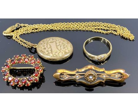 9CT GOLD &amp; YELLOW METAL JEWELLERY - 4 items to include a 9ct gold oval brooch set with garnet colour stones, 2.5cms acros