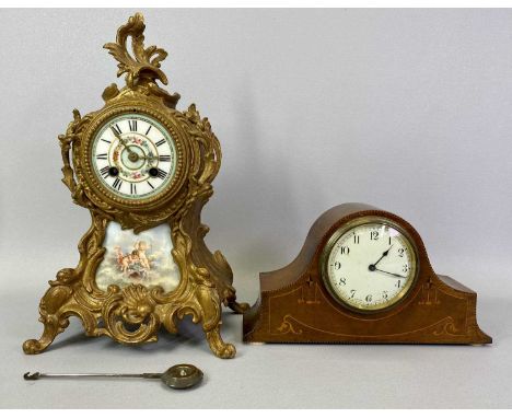 A FRENCH ROCOCO STYLE GILT PAINTED MANTEL CLOCK - late 19th century, circular porcelain dial hand painted with flowers and wi