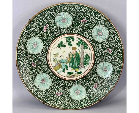 19TH CENTURY JAPANESE MEIJI PERIOD KUTANI PORCELAIN CHARGER, LARGE - decorated to the centre with figures, the borders with f