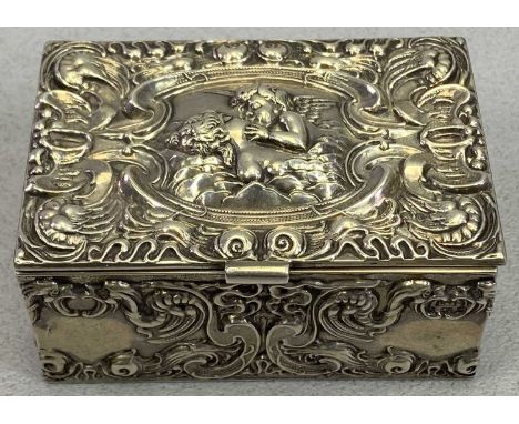 SILVER RING BOX - Birmingham 1903, Maker Levi &amp; Salaman, having near all over embossed and scrolled detail, the centre of