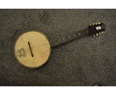 A vintage John Grey Banjolele, serial number G3697, with vintage case in disrepair