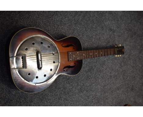 A vintage resonator acoustic guitar, having square neck , with f holes , very plain resonator with Radio Tone stamped to tail