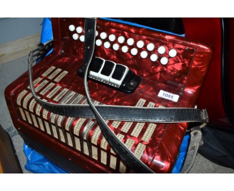 An unbranded button accordion, no case