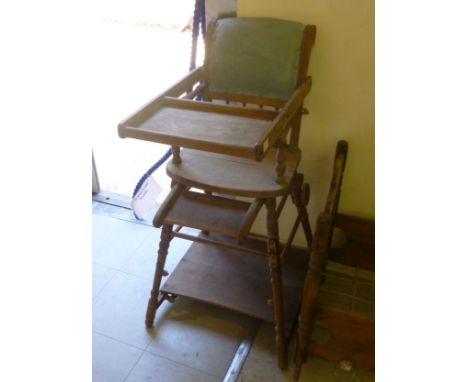 An early 20thC light oak framed metamorphic highchair, raised on ring turned, tapered supports, united by a platform shelf; a